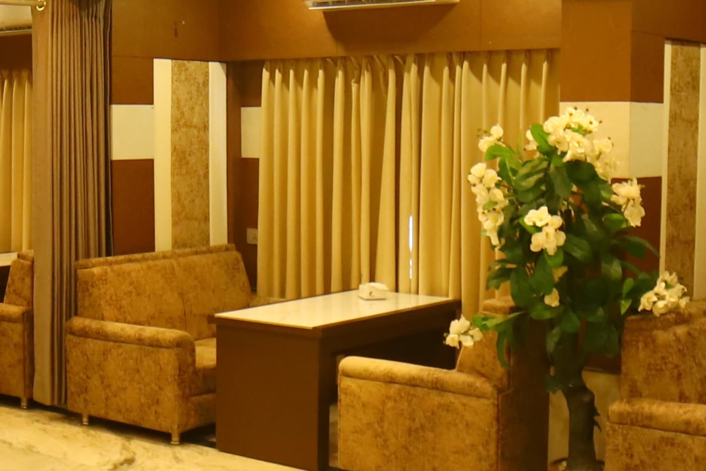 Lounge seating beside the restaurant floor