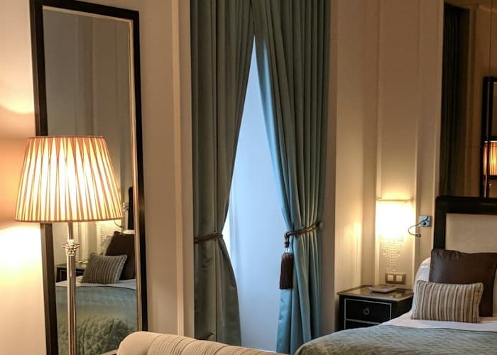The Suite Room, with a full-height mirror